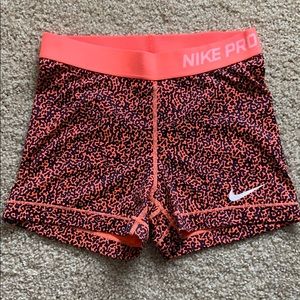 RARE neon orange and black Nike pros